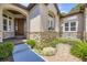 Inviting entrance with stone accents and decorative landscaping creates a warm and welcoming curb appeal at 11070 Meade Ct, Westminster, CO 80031