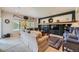 Cozy living room with a fireplace, plush seating, and a decorative mantel for a relaxing ambiance at 11070 Meade Ct, Westminster, CO 80031