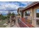 Exterior view of an upper level patio with scenic views at 28800 Stonecrop Trl, Conifer, CO 80433