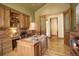 A richly appointed home office with custom wood detailing and marble desktop at 28800 Stonecrop Trl, Conifer, CO 80433