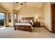 Inviting main bedroom with a large window view and a comfortable king-size bed at 28800 Stonecrop Trl, Conifer, CO 80433