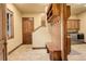 An inviting mudroom space with built-in bench and cabinetry at 28800 Stonecrop Trl, Conifer, CO 80433