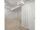 Unfinished basement showcasing neutral carpet, lighting, storage areas, and electrical outlets at 11578 Clayton St, Thornton, CO 80233
