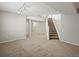 Spacious basement with carpet, stairs, and ample lighting at 11578 Clayton St, Thornton, CO 80233