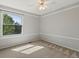 Comfortable bedroom with carpet, a ceiling fan, and a bright window with tree view at 11578 Clayton St, Thornton, CO 80233