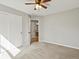 Spacious bedroom with carpet, ceiling fan, closet and an ensuite bathroom at 11578 Clayton St, Thornton, CO 80233