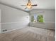 Spacious main bedroom with large window and ceiling fan at 11578 Clayton St, Thornton, CO 80233