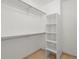 A well-organized walk-in closet offering ample shelving and hanging space at 11578 Clayton St, Thornton, CO 80233
