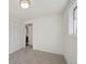Bright bedroom featuring neutral wall colors, a closet, and ample natural light at 7410 S Dahlia Ct, Centennial, CO 80122