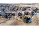 Drone shot of a neighborhood showcasing the layout and surroundings of a gray two-story home at 4695 Bobolink Dr, Castle Rock, CO 80109