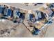 An aerial view shows homes bordering open space with fire pits near the property line at 4695 Bobolink Dr, Castle Rock, CO 80109
