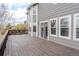 Spacious back deck with gray facade at 4695 Bobolink Dr, Castle Rock, CO 80109