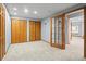 Bedroom with ample closet space and a door that lets in plenty of natural light at 4695 Bobolink Dr, Castle Rock, CO 80109
