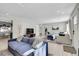 Spacious living room with plenty of natural light, comfortable seating, and modern decor at 33477 Valley View Dr, Evergreen, CO 80439
