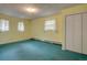 Bright bedroom with ample natural light and closet space, providing a comfortable and functional space at 28858 Richmond Hill Rd, Conifer, CO 80433