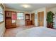 Well-lit bedroom featuring classic wooden dressers and ample closet space at 28858 Richmond Hill Rd, Conifer, CO 80433