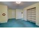Comfortable bedroom featuring carpet, natural light, and built-in storage providing a functional space at 28858 Richmond Hill Rd, Conifer, CO 80433