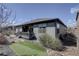 Backyard with small patio and artificial turf at 9750 Taylor River Cir, Littleton, CO 80125