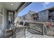 Charming covered patio with outdoor furniture, perfect for enjoying the outdoors at 9750 Taylor River Cir, Littleton, CO 80125
