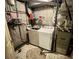 Utility room featuring a washer, a dryer, shelving, and basic utilities at 363 Wadsworth Cir, Longmont, CO 80504