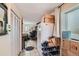 Hallway leading to living area with closet and kitchen access at 347 Bannock St, Denver, CO 80223