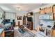Comfortable living room featuring wood cabinets and modern appliances at 347 Bannock St, Denver, CO 80223