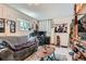 Comfortable living room with tile flooring and natural light, perfect for relaxation at 347 Bannock St, Denver, CO 80223