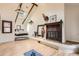 Tranquil bedroom featuring a fireplace, skylight, and elegant decor at 347 Bannock St, Denver, CO 80223