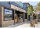 The Irish Rover, street view of building front with large windows and stone facade at 347 Bannock St, Denver, CO 80223