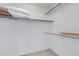 Spacious walk-in closet with adjustable shelving and ample hanging space offers great organization and storage solutions at 18384 E Bethany Pl, Aurora, CO 80013
