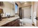 Bathroom featuring granite counters and updated fixtures at 5261 Sedona Dr, Parker, CO 80134