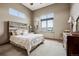Bedroom featuring large windows and an en suite bathroom at 5261 Sedona Dr, Parker, CO 80134