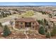 Beautiful two-story home featuring a tile roof, manicured landscaping, and proximity to a golf course at 5261 Sedona Dr, Parker, CO 80134