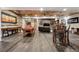 Spacious game room with pool table, stone wall details, and an open layout at 5261 Sedona Dr, Parker, CO 80134