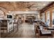 Wide view of Basement features wood ceiling, bar, lounge, and game room at 5261 Sedona Dr, Parker, CO 80134