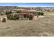 Sprawling property featuring a large backyard, mature trees, and stunning views of the surrounding landscape at 5261 Sedona Dr, Parker, CO 80134
