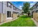 Green backyard featuring a well-maintained lawn and privacy fences at 17225 Lark Water Ln # C, Parker, CO 80134