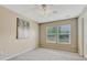 Bedroom features two windows providing ample natural light and warm-toned walls at 17225 Lark Water Ln # C, Parker, CO 80134
