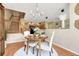 The dining area showcases seamless flow to the kitchen and staircase, enhancing connectivity at 17225 Lark Water Ln # C, Parker, CO 80134