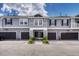 Charming townhome featuring neat landscaping, covered entryway and attached garages at 17225 Lark Water Ln # C, Parker, CO 80134