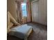 bedroom features a cozy floor bed with a fun teepee, curtains, and sliding door closet at 17421 E Grand Ave, Aurora, CO 80015