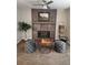 Cozy living area with a fireplace, elegant decor, and comfortable seating at 17421 E Grand Ave, Aurora, CO 80015