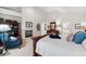 Spacious main bedroom with fireplace, ensuite bathroom, and walk-in closet at 3080 Big Bear Dr, Sedalia, CO 80135