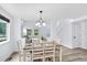 Cozy dining area offering hardwood floors and natural light, perfect for Gathering meals at 1920 E 145Th Ave, Thornton, CO 80602