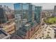 Aerial perspective of a modern high-rise residential building at 1700 Bassett St # 1008, Denver, CO 80202