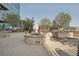 Outdoor entertaining area with fire pit and grills at 1700 Bassett St # 1008, Denver, CO 80202