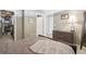 Relaxing bedroom showcases a spacious closet and a view of the hallway at 1700 Bassett St # 1008, Denver, CO 80202
