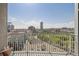 Balcony view with sprawling cityscape, showcasing nearby park at 1700 Bassett St # 1008, Denver, CO 80202