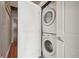 Convenient laundry area with stacked washer and dryer units, maximizing space at 1700 Bassett St # 1008, Denver, CO 80202