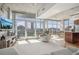 Modern living room with hardwood floors and city views at 1700 Bassett St # 1008, Denver, CO 80202